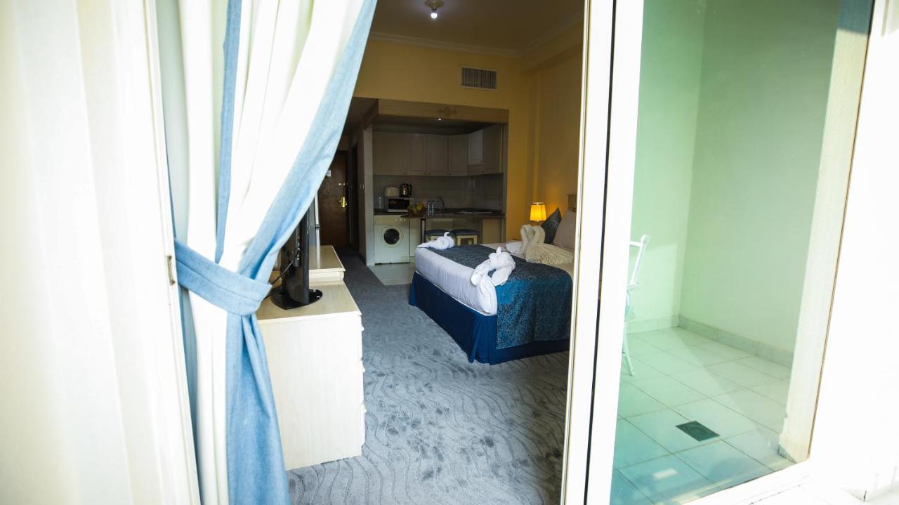 Green House Hotel Suites & Apartment Dubái Exterior foto